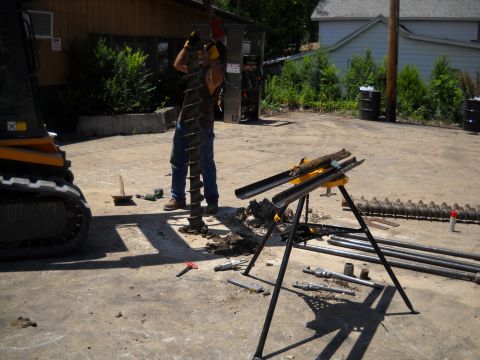 Earth Services Benton, IL - Skid Steer-Mounted Drill Auger Tool